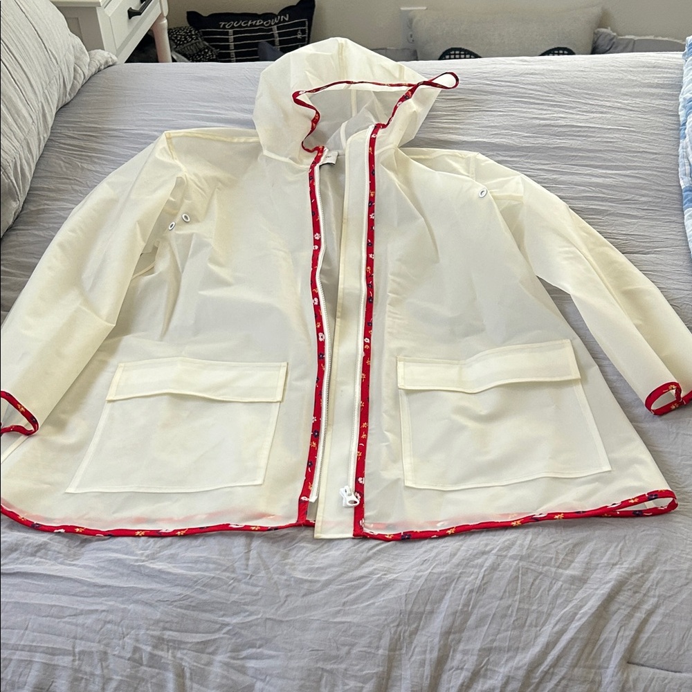 Ivory hooded clear spring raincoat